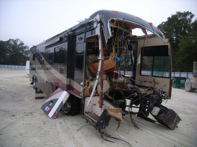 Name:  Wasted Front Damaged RMR Monocoque Motorhome Passenger Side.JPG
Views: 589
Size:  94.3 KB